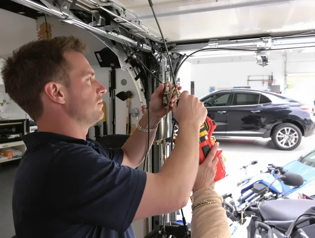 Coral Springs Garage Door Repair safety certified technician performing cable replacement in Coral Springs