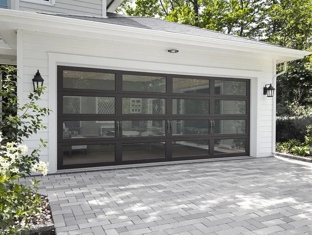 Coral Springs Garage Door Repair design specialist presenting custom garage door options to Coral Springs homeowner