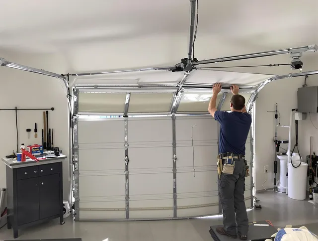 Coral Springs Garage Door Repair specialist performing precise section replacement on Coral Springs garage door