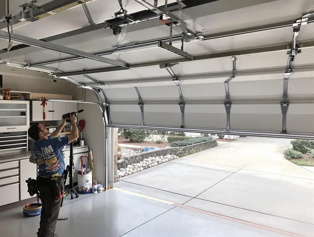 Garage door track repair service by Coral Springs Garage Door Repair in Coral Springs